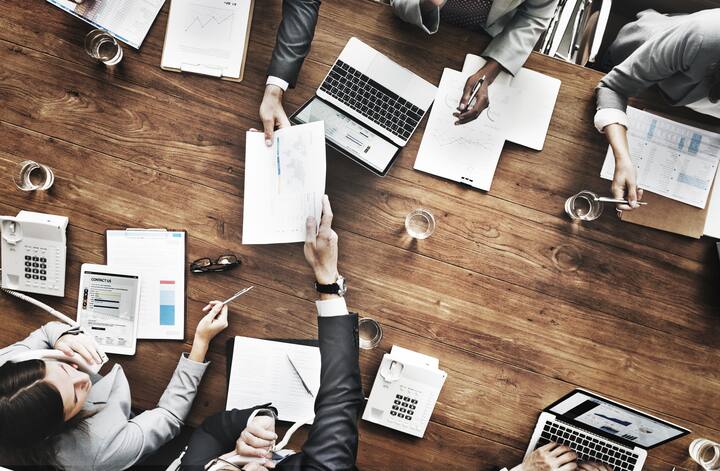 Business People Analyzing Statistics Financial Concept