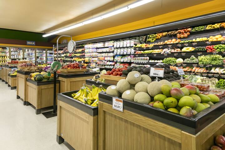 Produce section in grocery store wide angle
