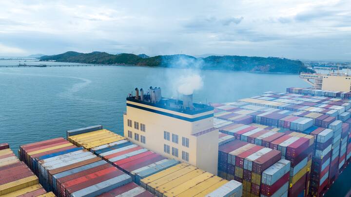 Smoke exhaust gas emissions carbondioxide from cargo lagre ship container ship,Marine diesel engine exhaust gas from combustion, Gas Emission Air Pollution from transportation. green house effect Eco. 