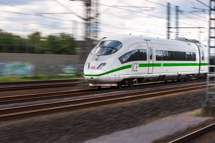 troidsorf, North Rhine-Westphalia/germany - 13 08 19: ICE train speeding with new green paint near troisdorf germany