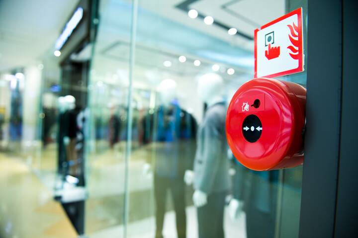 Fire alarm on the wall of shopping center.