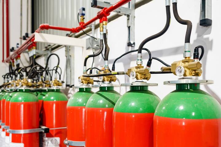 Hazard fire suppression system of a gas fire extinguishing. a closeup of the fire extinguishing system in an office building